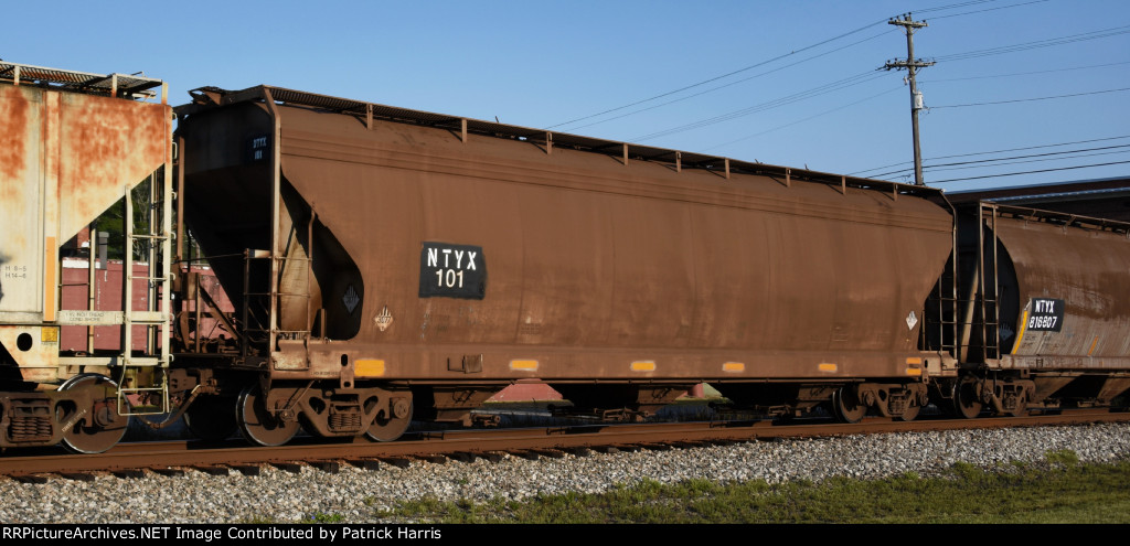 NTYX 101 X-UNK ACF 4650cf 3-gate centerflow covered hopper with 3077 environmentally hazardous substance solid n.o.s. lading on CSX Athens AL 7-51PM 09-10-2021